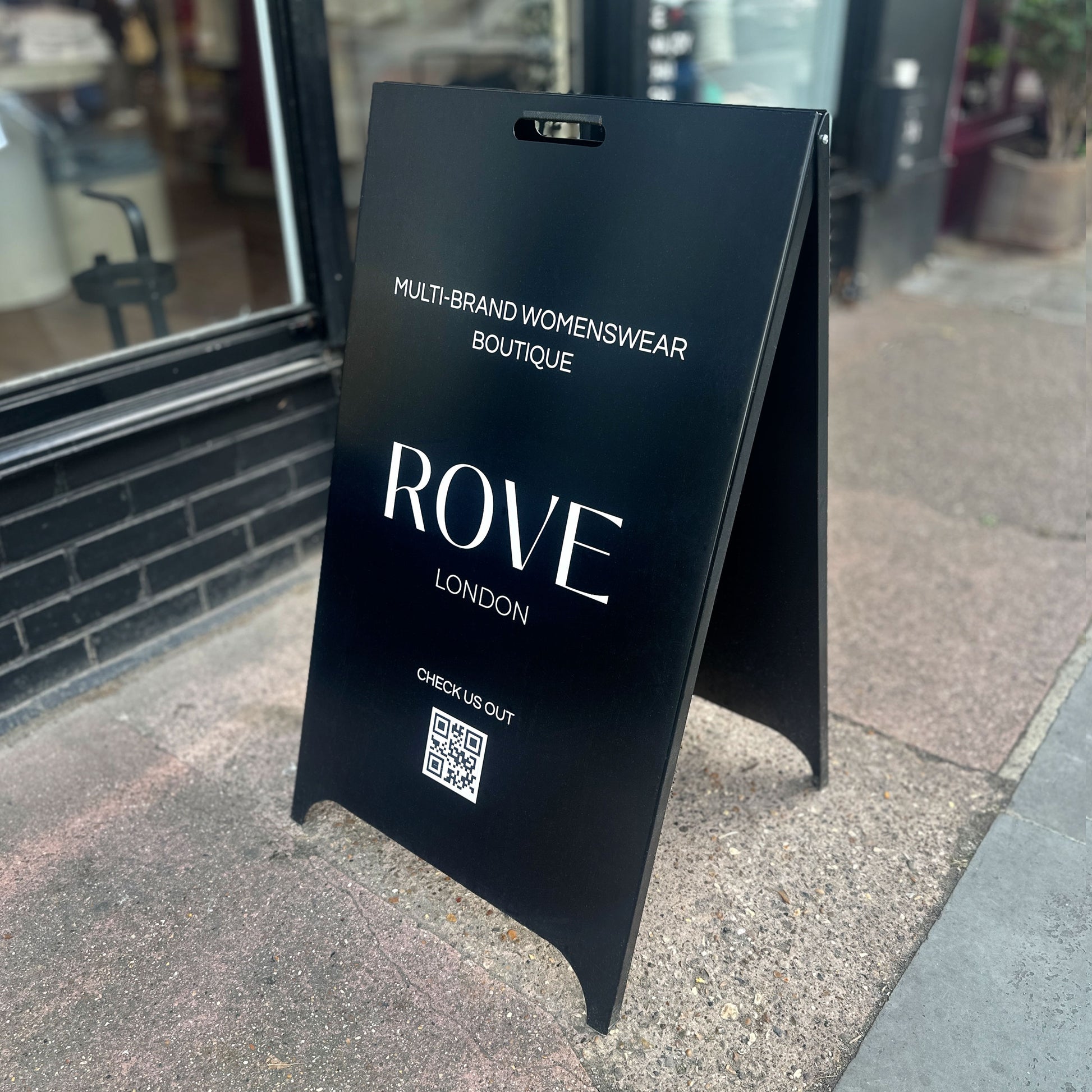 Black Pavement Sign