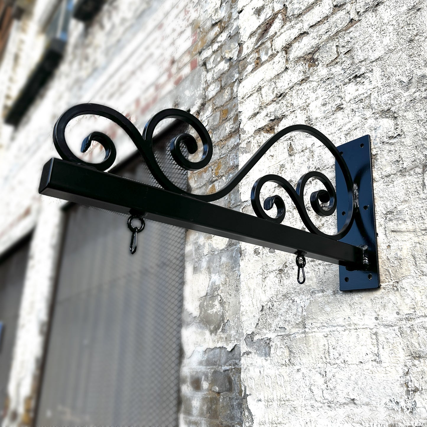 Iron scroll work ornate hanging wall bracket 