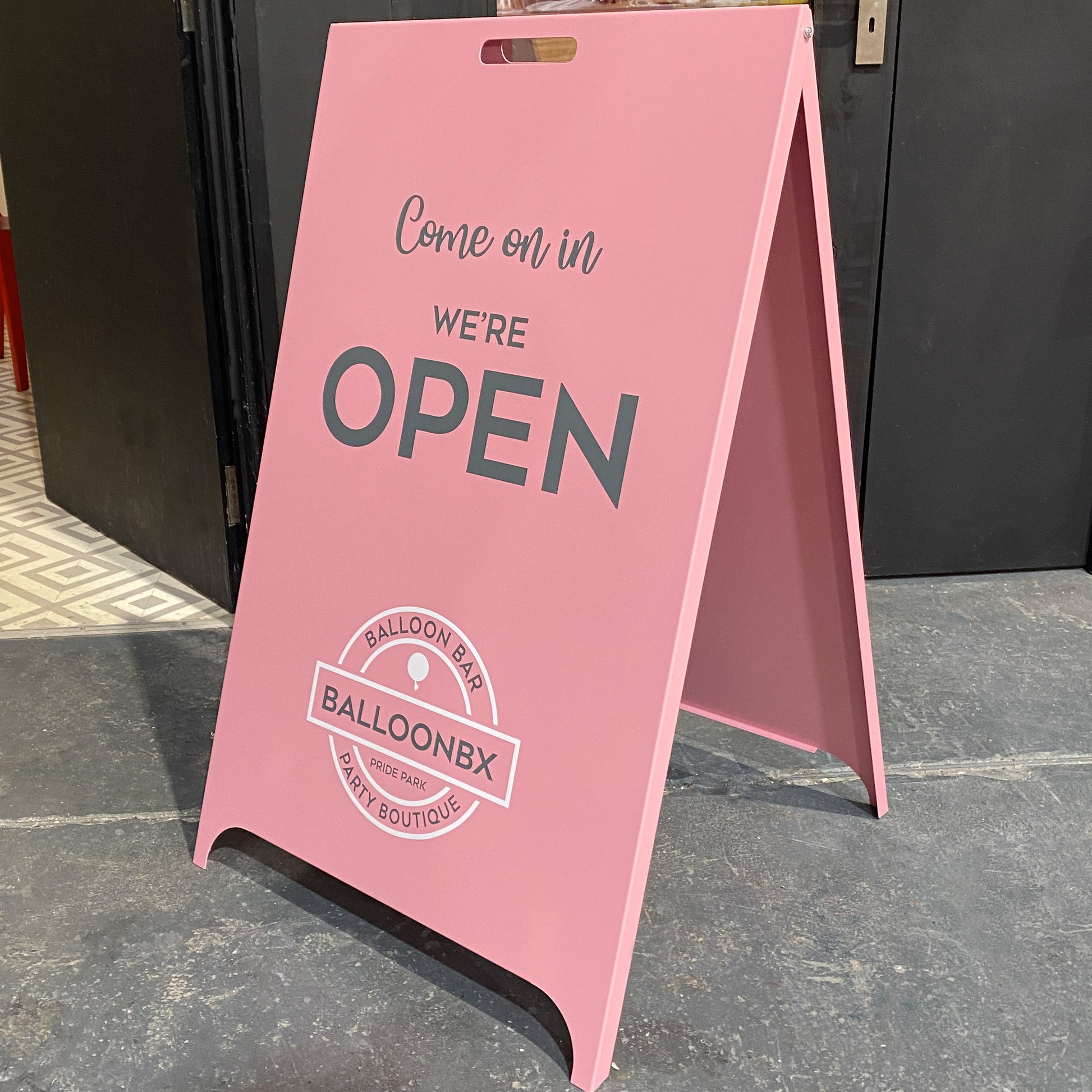 Pink Pavement Sign