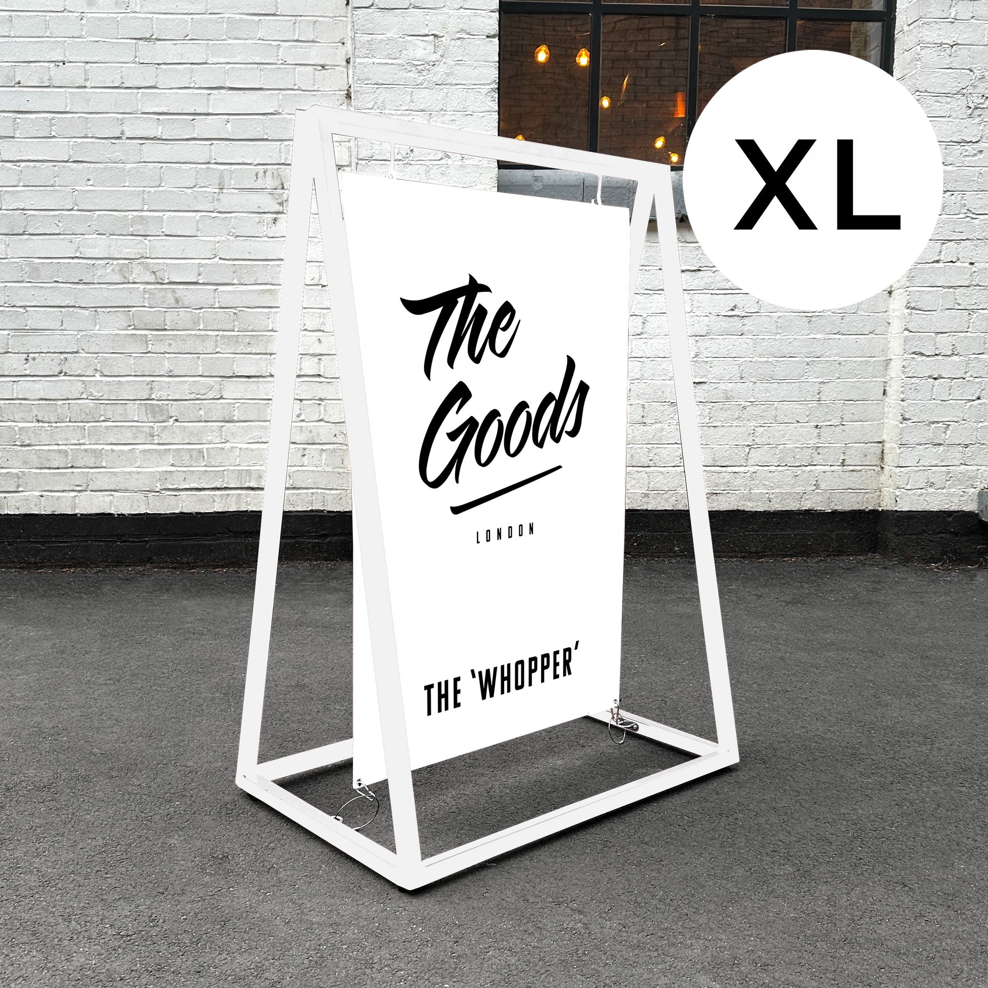 Giant swinging pavement sign